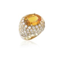 18kt yellow gold with natural orange sapphire circa 10.50 ct