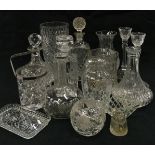 Large collection of assorted crystal glassware to include decanters, vases and candlesticks.