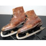 A pair of quality antique Lillywhites Criterion ice skates with tan leather uppers. Adult size 8 1/2