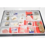 Small collectors box containing a selection of minerals and semi precious stones