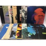 14 ROCK RELATED VINYL LP RECORDS. This selection of albums include - Rainbow - Genesis - Rick