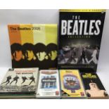 BEATLES MEMORABILIA COLLECTION. This selection of items include 16 vinyl 7” records - 2 x VHS