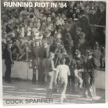 COCK SPARRER LP RECORD 'RUNNING RIOT IN '84'. Re-issue still factory sealed on Santa Records.