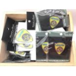 BOX OF GUITAR PICK COLLECTABLES. Quantity of key rings and badge type metal Liverpool rock & roll