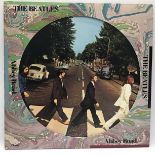 THE BEATLES ‘ABBEY ROAD’ 12" PICTURE DISC VINYL LP. This vinyl picture disc was recorded on