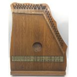 A VINTAGE ZITHER. An antique 'Piano Chord' Zither, in original case with key for tuning.