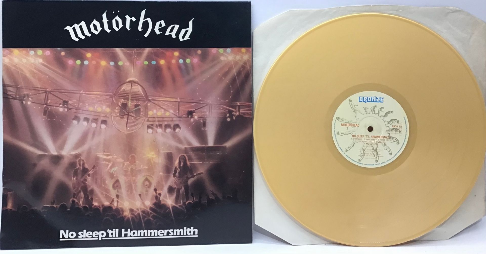 MOTORHEAD “NO SLEEP TIL HAMMERSMITH” VINYL LP RECORD. This is found here on gold coloured vinyl on