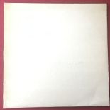 THE BEATLES UNNUMBERED WHITE ALBUM. This double album found here in VG+ condition on Apple Records