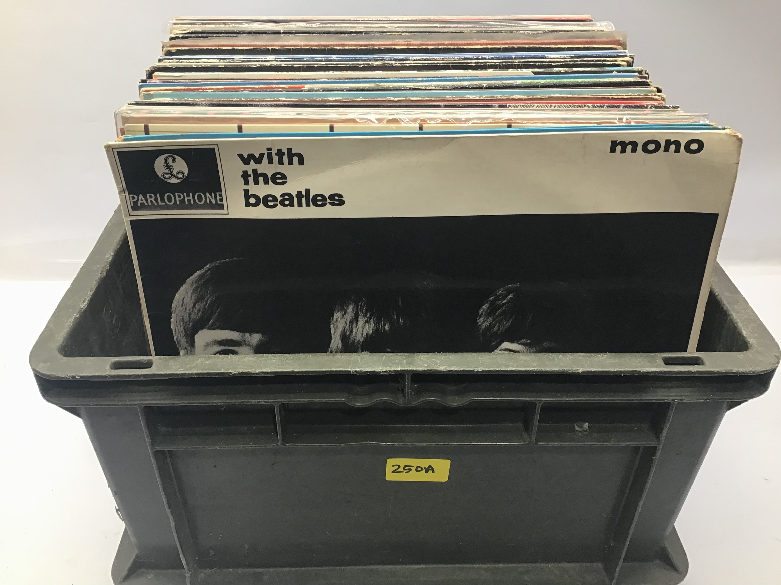 A BOX OF VARIOUS ROCK AND POP LP RECORDS. These records include The Beatles - Madonna - Madness