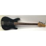 ELECTRIC BASS GUITAR. This is an Encore guitar and is missing one of the tone control plastic