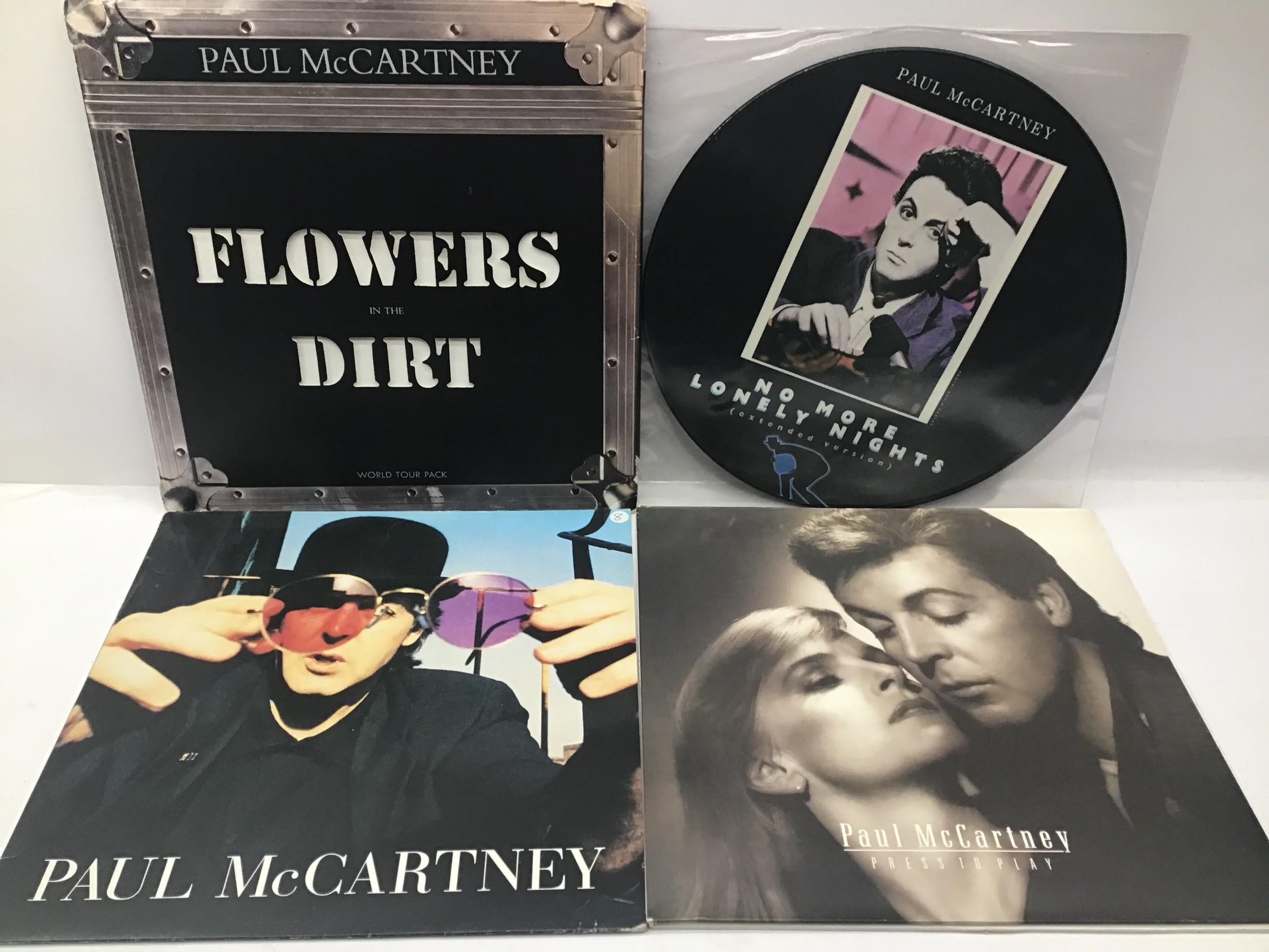 PAUL McCARTNEY SELECTION OF VINYL 12” RECORDS. This selection consists of - Flowers in the Dirt Worl