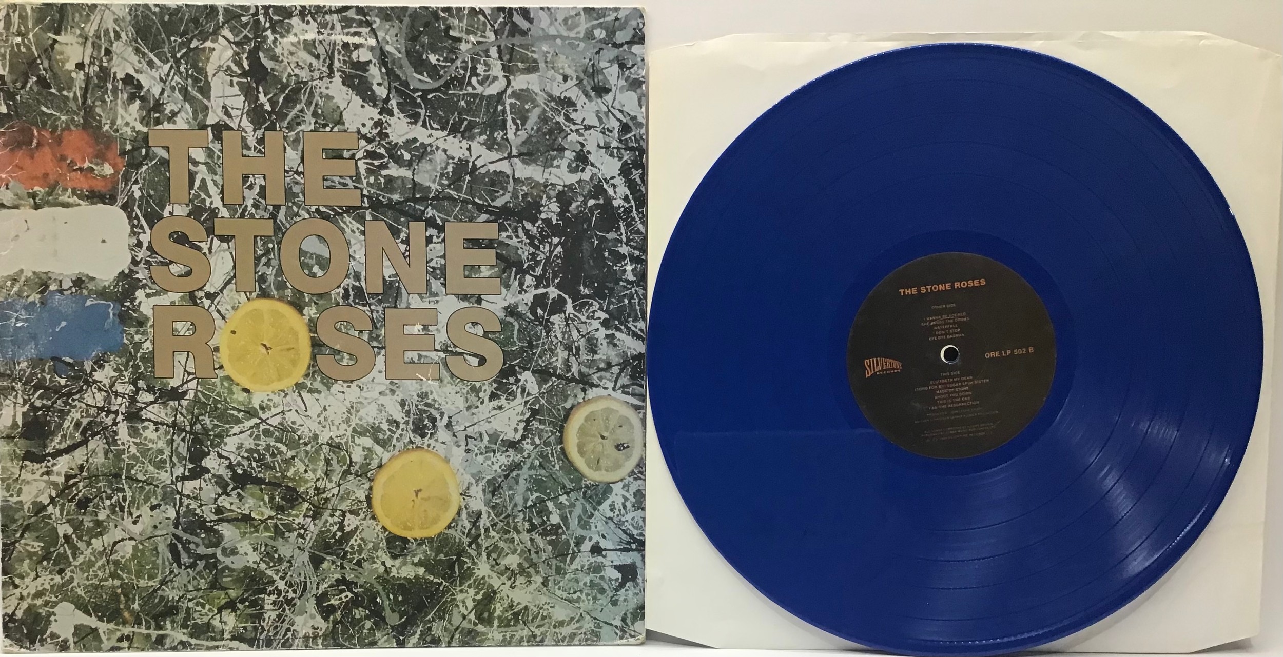 THE STONE ROSES - “STONE RORSES” BLUE VINYL LP. Self titled album from 1989 pressed on Silvertone