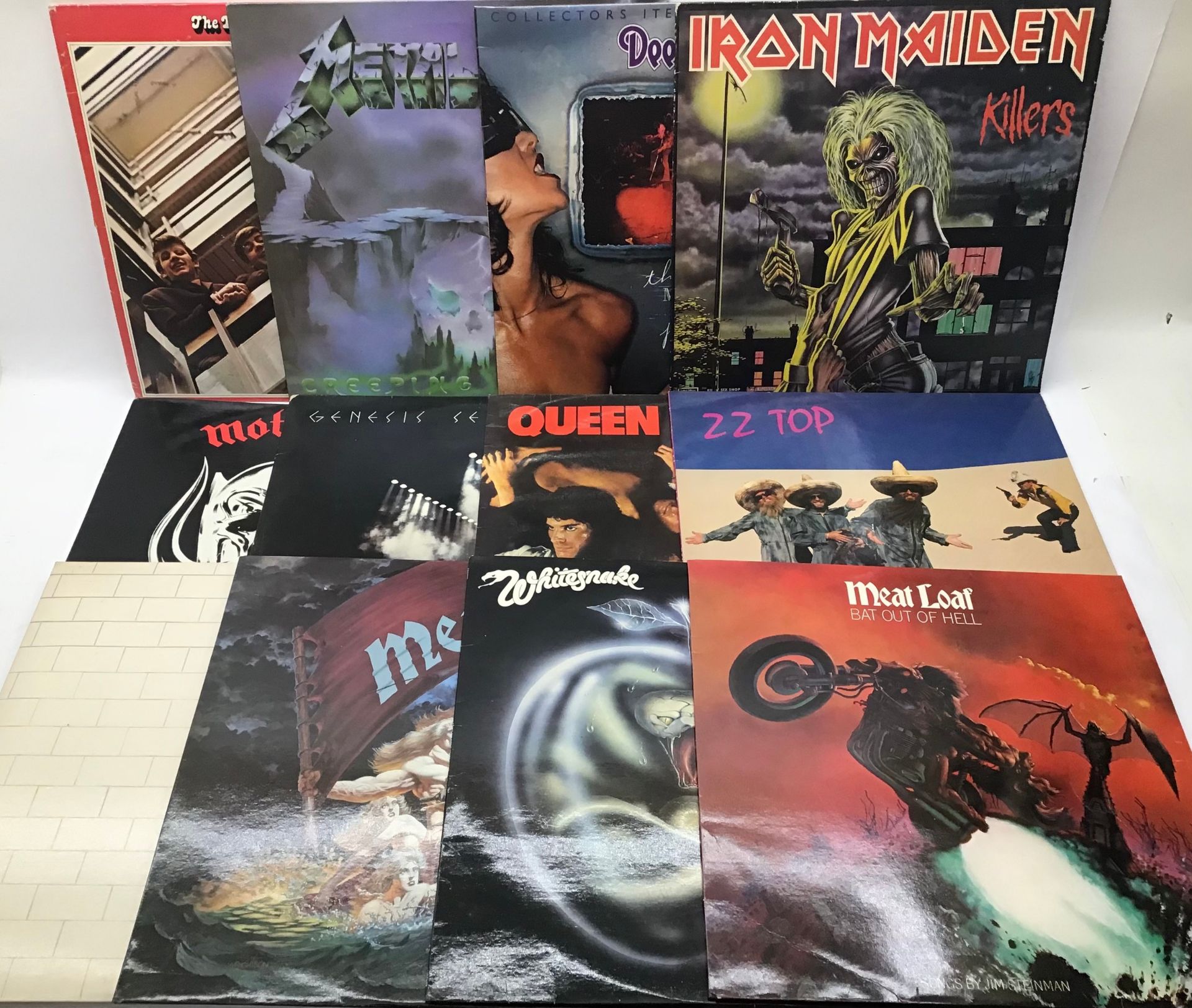 12 ROCK RELATED VINYL LP RECORDS. To include artists - Pink Floyd - Iron Maiden - Meatloaf x 2 -
