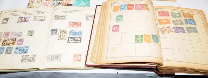 A number of vintage schoolboy stamp albums containing many world stamps. Includes Penny Black, Penny - Image 2 of 8