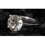 A Platinum diamond solitaire ring, size K, approx. just over 3ct, colour M Clarity VVS2. Buyers