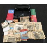 Suitcase containing a large collection of ephemera, vintage newspapers, cigarette cards and