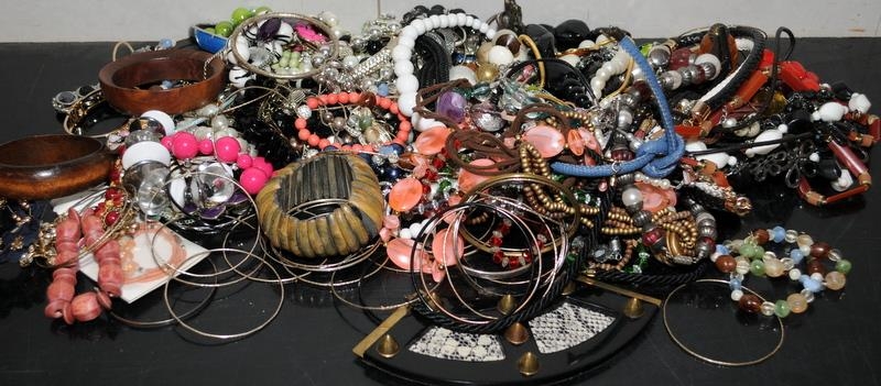 Large quantity of costume jewellery necklaces, bangles and bracelets