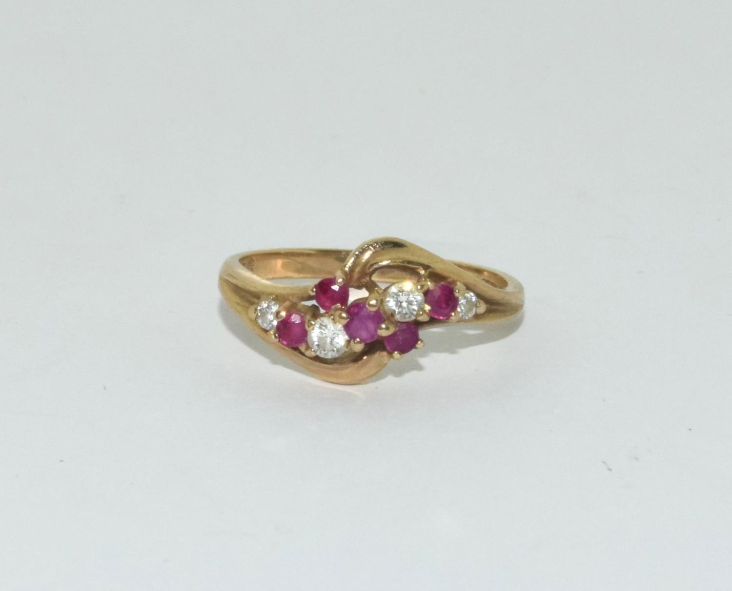 9ct gold ladies diamond and ruby twist ring size N - Image 6 of 6