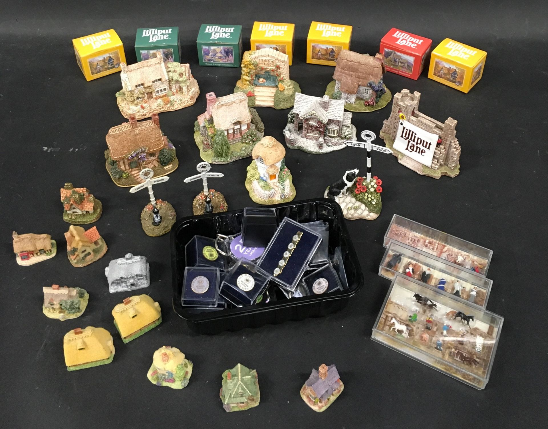 Various Lilliput lane collectors badges, miniature cottages some boxed, lilliput lane mini figures