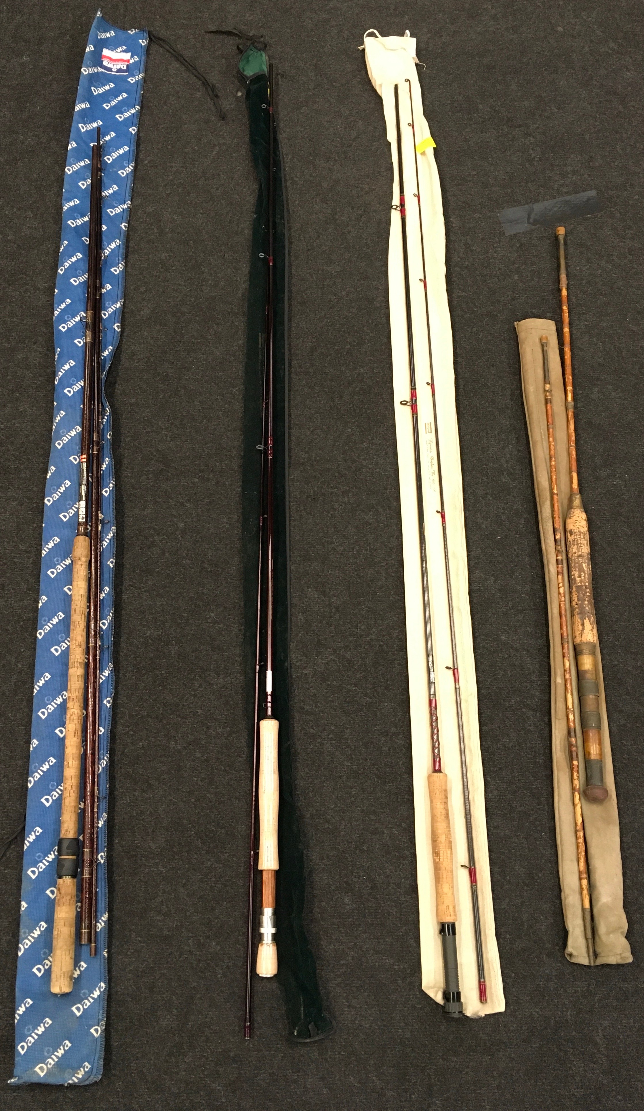 Collection of fishing rods to include Daiwa, Shakespeare and two others (4).