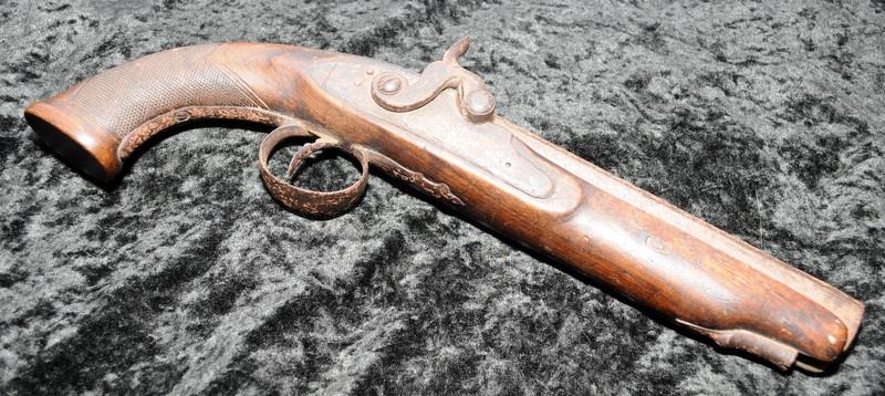 Antique full size flintlock pistol, lock plate engraved with maker LG Smith. Working mechanism. This