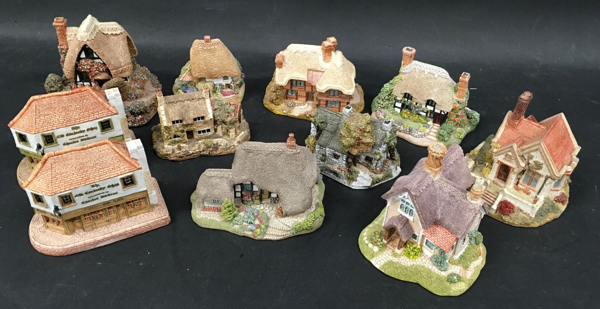 Lilliput lane x 11 to include Old curiosity shop, Swift Hollow, Clockmakers cottage etc