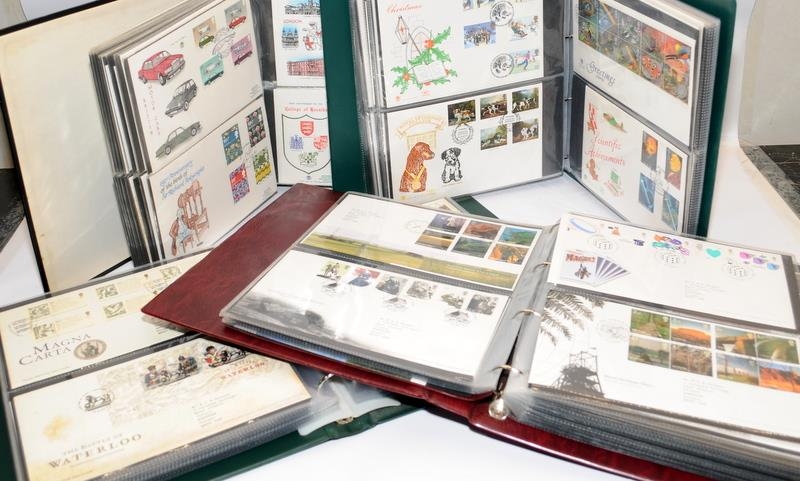 Four large albums of mostly GB first day covers