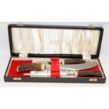 George Butler of Sheffield.3 piece carving set with stag horn handles presented in original box