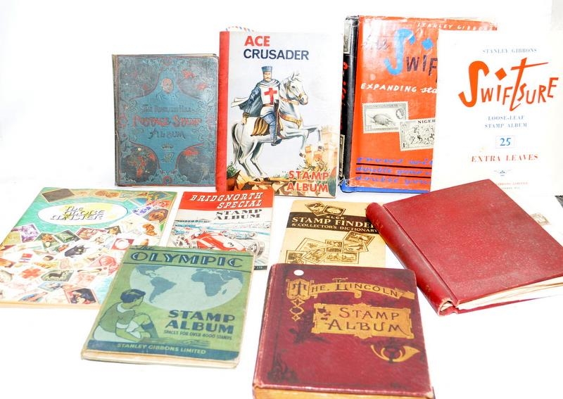 A number of vintage schoolboy stamp albums containing many world stamps. Includes Penny Black, Penny