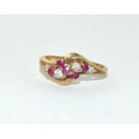 9ct gold ladies diamond and ruby twist ring size N