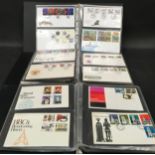 Three albums of assorted first day covers.