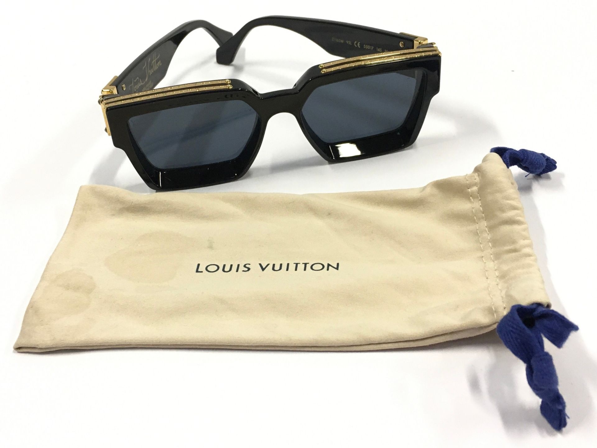 A pair of Louis Vuitton 1.1 Millionaire sunglasses with dust bag.