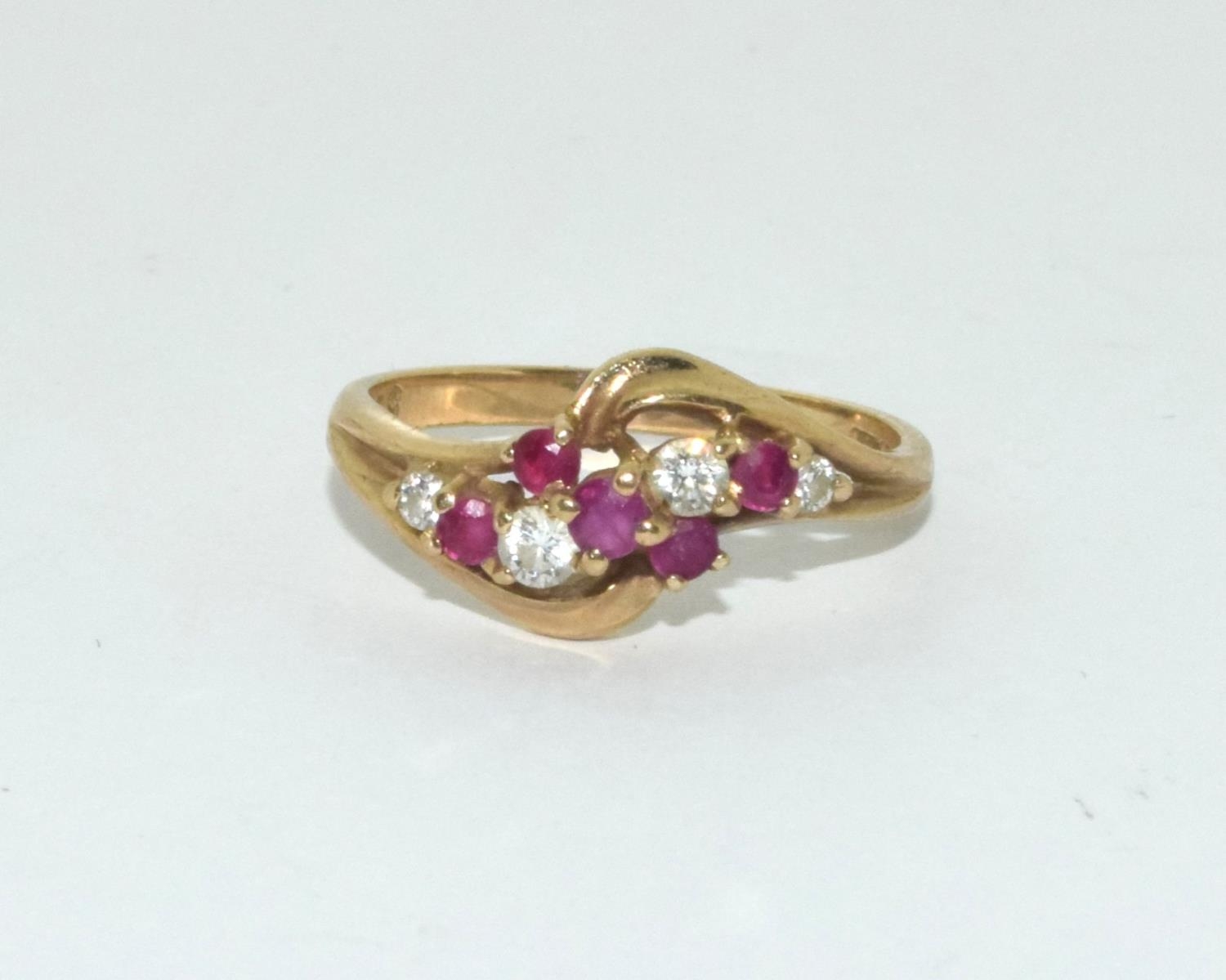 9ct gold ladies diamond and ruby twist ring size N - Image 5 of 6