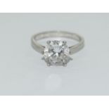 Silver ladies solitaire ring. Size K.