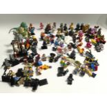 100+ Lego mini figures to include Star Wars, Batman, Wizard of Oz and others.
