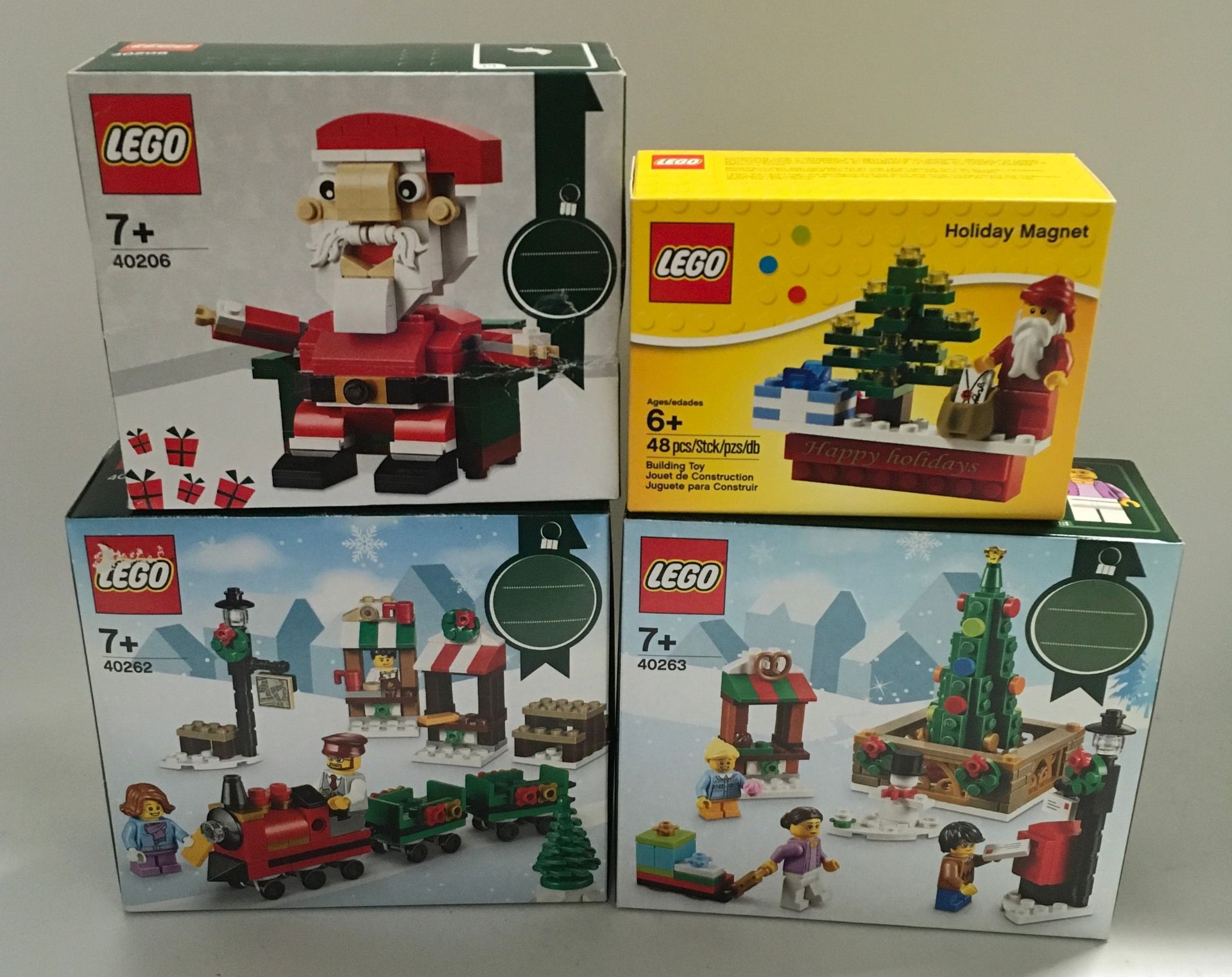 4 x Christmas related Lego sets to include 40262 Train Ride, 40263 Town Square, 40206 Santa and