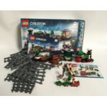 Lego Creator 10254 Winter Holiday Train set and 40262 Christmas Train Ride. Both sets have a few