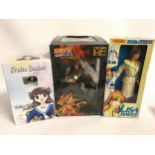 3 boxed figures to include Naruto, Tohru Honda Statue and Matchbox Robotech Lisa Hayes.