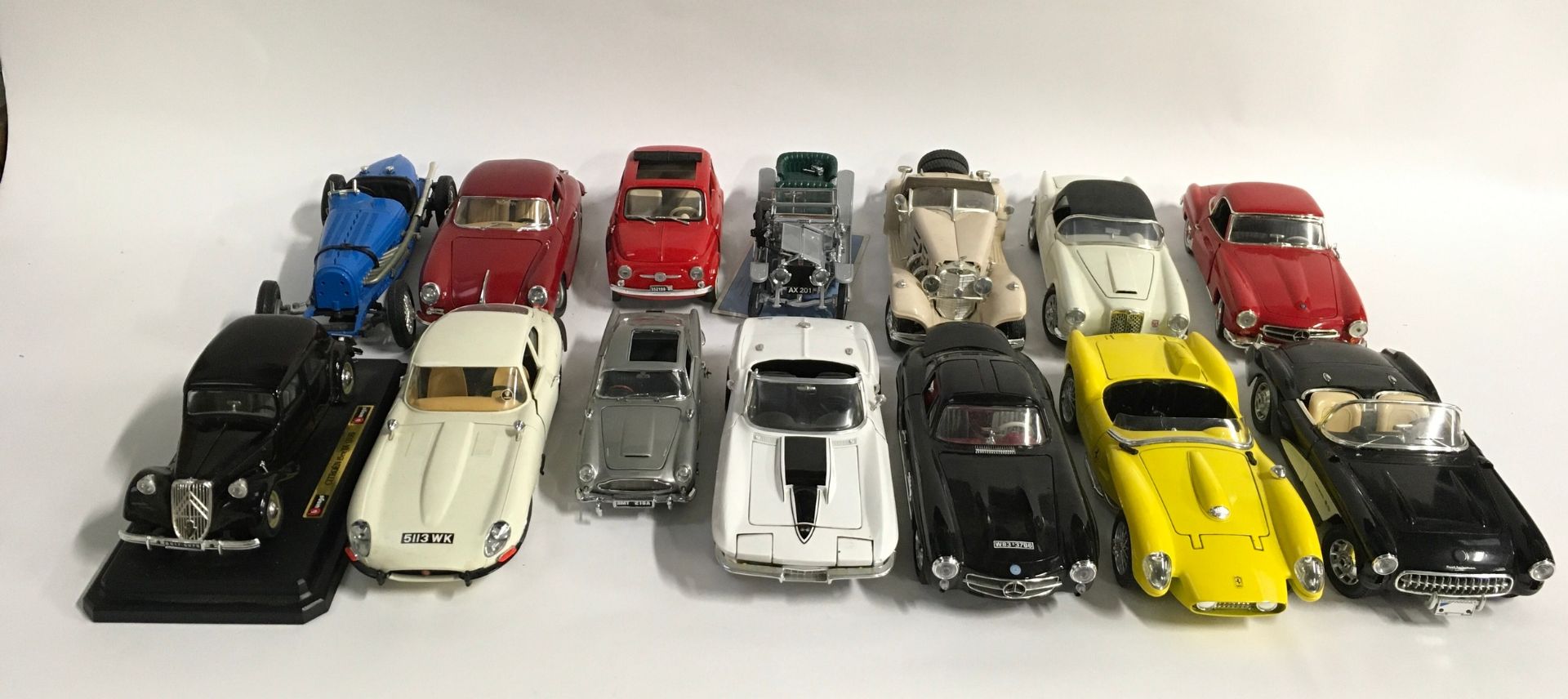 Collection unboxed diecast models to include Burago, Franklin Mint, Solido and ERTL. (14)