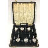 A boxed set of six silver coffee bean spoons Sheffield 1923.