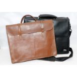 Two vintage leather attache bags, one black and one tan