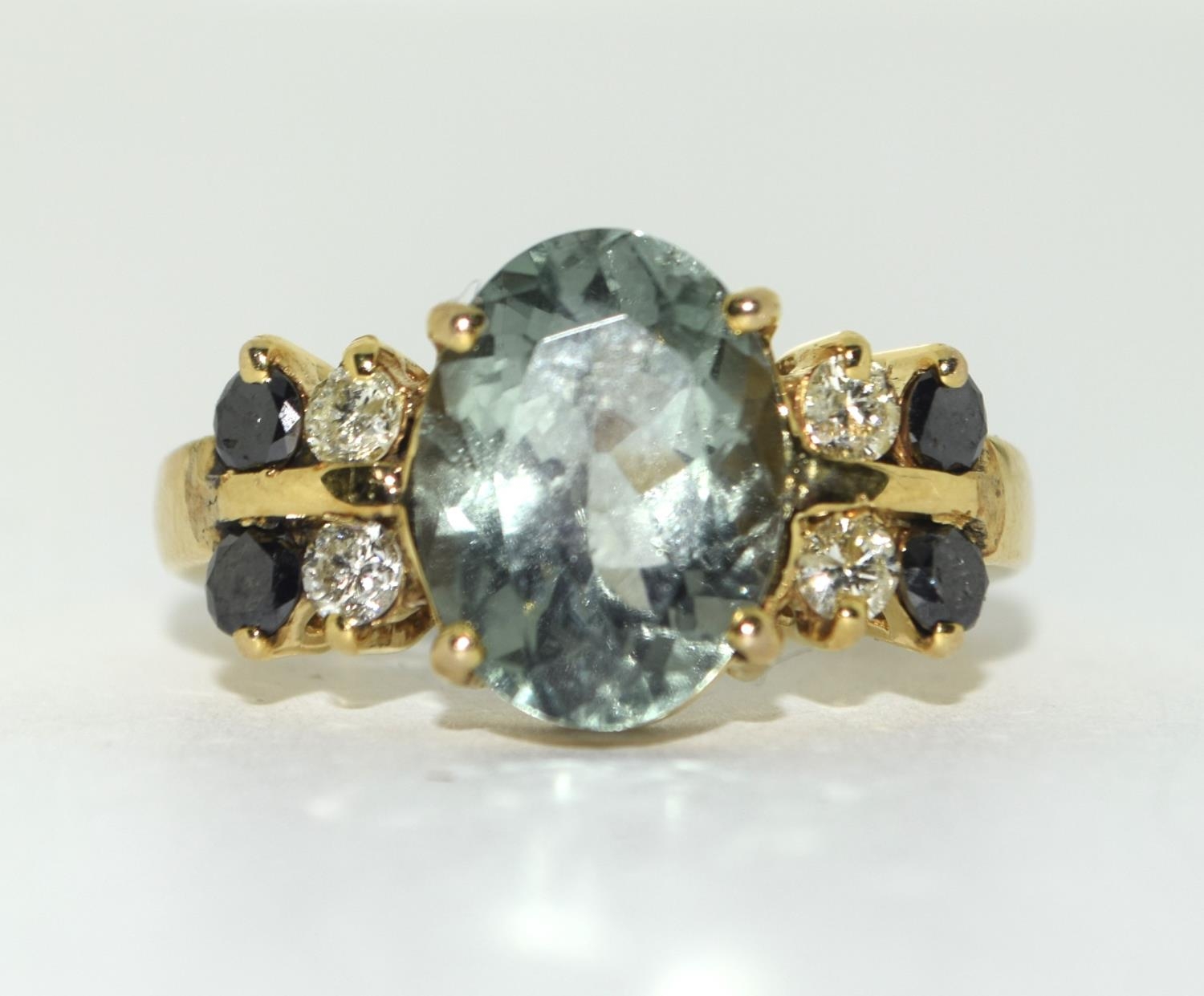 Yellow metal Black and White Diamond with Blue Topaz centre stone. Size Q. - Image 5 of 5