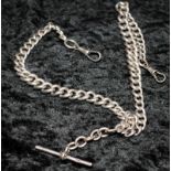 Silver graduated double Albert watch chain.
