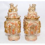 Pair of antique Japanese Satsuma lidded vases in square form with yin and yang Dogs of Foo