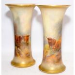Superb H Stinton signed Royal Worcester gilded blush ivory trumpet vases decorated with Highland