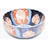 Vintage Oriental bowl with staple repair. 27.5cms across