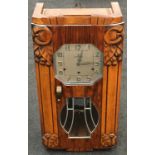 Vedette quality French Art Nouveau oak cased wall hanging chiming clock 73x35x18cm.