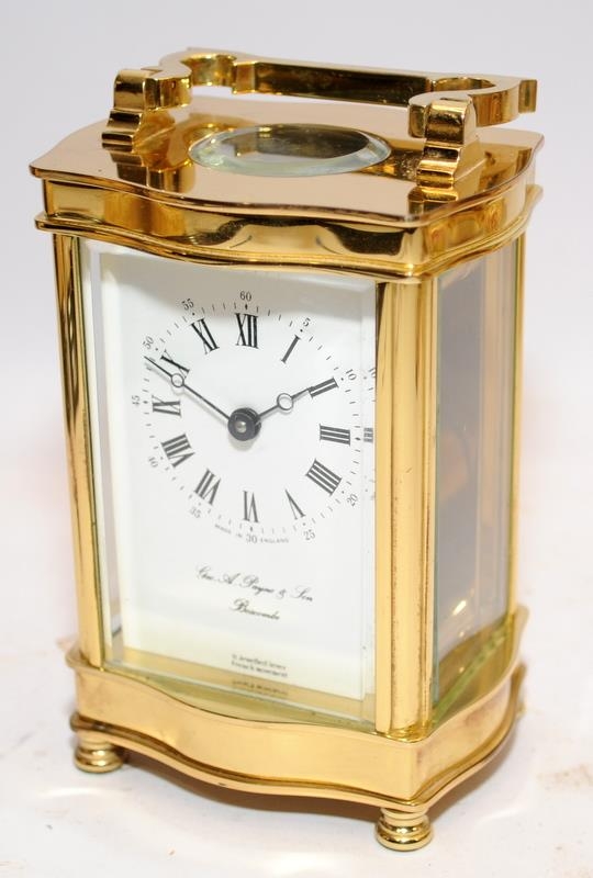 Quality brass 8 day carriage clock with French lever movement. Dial signed by local jeweller