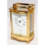 Quality brass 8 day carriage clock with French lever movement. Dial signed by local jeweller