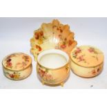 A collection ofRoyal Worcester gilded blush ivory items with hand painted decoration to include a